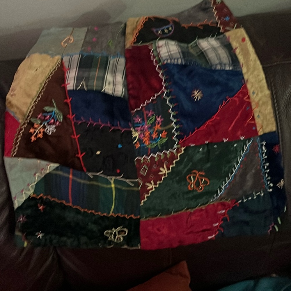 It’s patchwork, some parts velvet, and it’s a mini!! Fun!! Unique. Vintage Gap